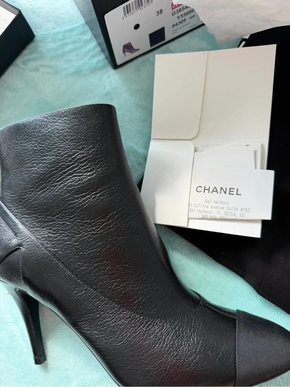 CHANEL Black Leather Ankle Booties with Black Cap Toe and Gold CC